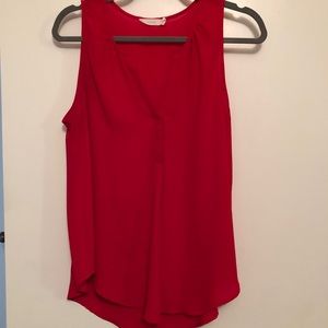 Red sleeveless blouse